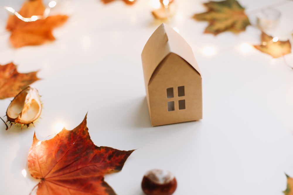 Cozy,Autumn,Composition.,Paper,House,Surrounded,By,Autumn,Leaves,On